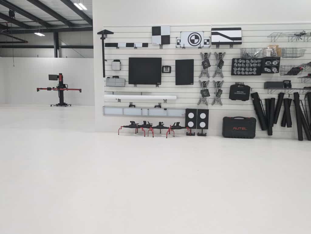 Car calibration shop with tools and monitors